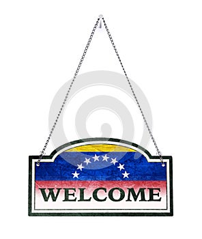 Venezuela welcomes you! Old metal sign isolated