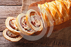 Venezuelan bread pan de jamon close-up on the table. horizontal