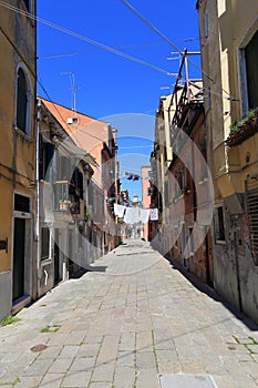 VENICE - APRIL 10, 2017: The view on alley in Venice. Laundry dr