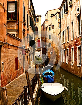 Venice Canal with Blue boat