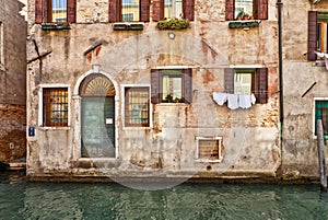 Venice canal and water door photo
