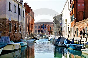 Venice canal, water, romantic buildings, boats, colours, history and timeless architecture