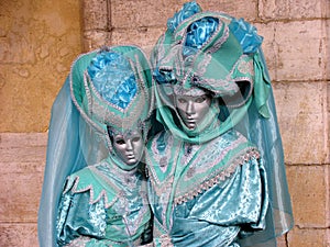 Venice Carnival: Couple in turquoise costumes