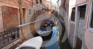 Venice city in Italy with water boats and tourist on vacation