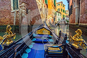 Venice cityscape and canal with gondola ride