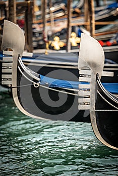 Close-up of two Gondola prows in Venice Veneto Italy photo