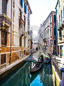 Venice gondolier driving gondola