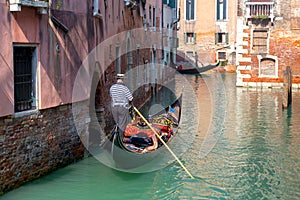 Venice. Gondolier in the gondola.