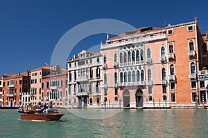 Venice, the Grand Canal, gondola ride, walk along the canals, marble fasades of the palases.