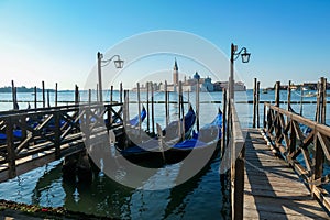 Venice - Group of gondolas moored by Saint Mark square in city of Venice, Veneto, Northern Italy