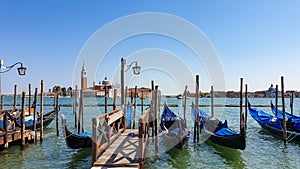 Venice - Group of gondolas moored by Saint Mark square in city of Venice, Veneto, Northern Italy