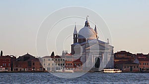 Venice, Italy - 16.08.2018: Gondolas and buses In Venice, Italy`s Grand Canal