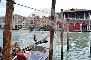 Beautiful panoramic view to the Grand canal intense gondolas marine traffic in a sunny spring day.