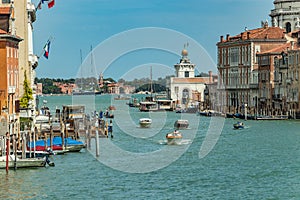 VENICE, ITALY - August 02, 2019: Grand Canal with Basilica di Santa Maria della Salute in Venice, Italy. View of Venice Grand
