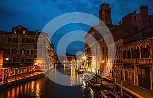 VENICE, ITALY - AUGUST 21, 2016: Famous architectural monuments, ancient streets and facades of old medieval buildings at night