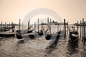 Venice.Italy. Tourists in gondolas sailing on the grand canal, toned- sepia