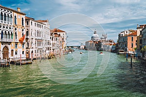 Venice, Italy. Beautiful view of Grand Canal and Basilica Santa Maria della Salute at sunny spring day