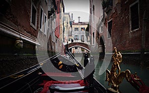 VENICE, ITALY - Feb 09, 2016: Gondola ride in the canals of Venice, Italy