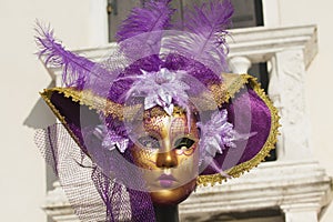 VENICE, ITALY - FEBRAURY 14, 2020: Black female carnival mask on carnival in Venice in 2020