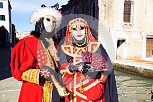 VENICE / ITALY - February 6 2016: Carnival performers participate this event in Piazza San Marco in Venice, Italy. The tradition b