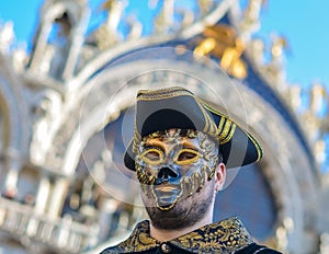 Venice, Italy, February 6, 2016 : man in mask and costume at the carnival in Venice. The Carnival of Venice is an annual festival,