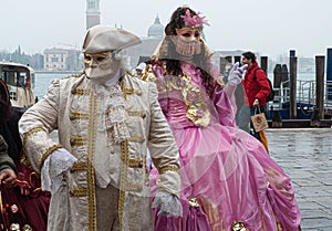 Venice, Italy, 2 february 2008. Beautiful couple carnival mask in Venice during mardi gras parade