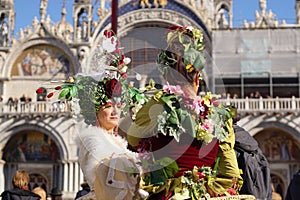 VENICE / ITALY - February 6 2016: Carnival performers participate this event in Piazza San Marco in Venice, Italy. The tradition b