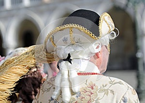 Venice, Italy - February 5, 2018: person with carnival mask