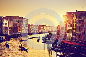 Venice, Italy. Gondolas on Grand Canal at gold sunset