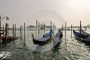 Venice Italy - Gondolas in lagoon and island of San Giorgio Maggiore