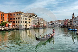Venice, Italy - 12.06.2019: Gondolas near to the Rialto bridge on Grand canal street in Venezia