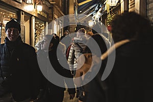 Crowd of people in Venice scene at night