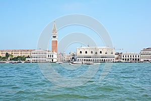 VENICE, ITALY - JULY 26, 2019:  Piazza San Marco with the Basilica of Saint Mark and the bell tower of St Mark`s Campanile
