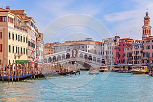 Venice, Italy - March 27, 2019: Beautiful vivid view of the famous Rialto Bridge Ponte Di Rialto over the Grand Canal