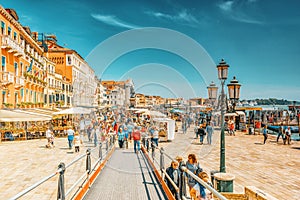 VENICE, ITALY - MAY 12, 2017 : Embankment of the Grand Canal with tourist near  Doge`s Palace and S.Marco square , Italy