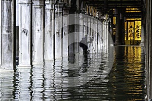 VENICE, ITALY - November 17, 2017: St. Marks Square Piazza San Marco during flood acqua alta in Venice, Italy. Venice high