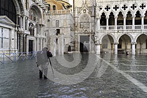 VENICE, ITALY - November 17, 2017: St. Marks Square Piazza San Marco during flood acqua alta in Venice, Italy. Venice high