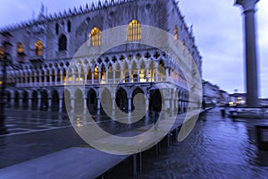 VENICE, ITALY - November 24, 2019: St. Marks Square Piazza San Marco during flood acqua alta in Venice, Italy. Venice high