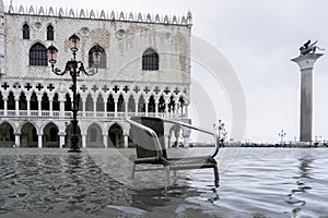 VENICE, ITALY - November 24, 2019: St. Marks Square Piazza San Marco during flood acqua alta in Venice, Italy. Venice high