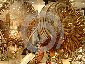 Venice, Italy, September 24, 2020. Venetian masks in a shop window, side view. Beautiful graceful bright carnival masks