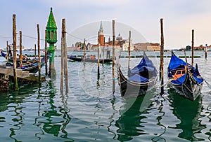 Gondolas along Grand Canal at St Marco square with San Giorgio M