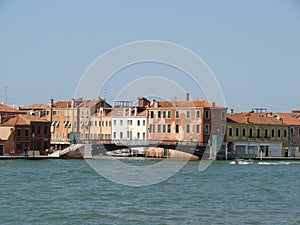 Venice. Italy. Unique Venetian views from the sea and land in the summer sunny day.