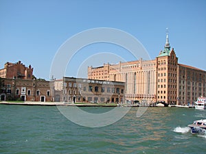 Venice. Italy. Unique Venetian views from the sea and land in the summer sunny day.