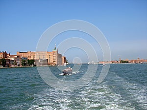 Venice. Italy. Unique Venetian views from the sea and land in the summer sunny day.