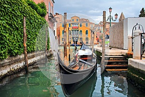 Venice, Italy. Venetian gondola traditional boat in water canal. Street exterior in Venezia with gondolas