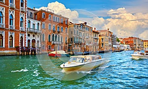 Venice, Italy. Veneto region. Motorboats moving by Grand Canal