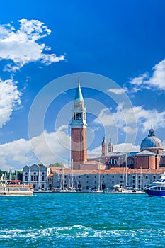 Venice landmark, view from sea of Piazza San Marco or st Mark square, Campanile and Ducale or Doge Palace. Italy, Europe