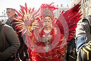 People in costumes and masks on Carnival in Venice