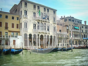 Venice panorama: canal, boats and old brick houses in Venice, Italy, Europe