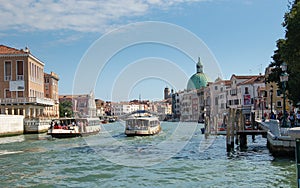 Venice panorama: canal, boats and old brick houses in Venice, Italy, Europe